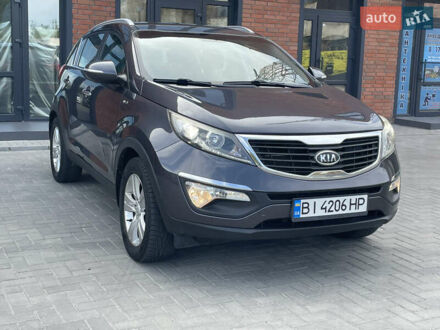 Серый Киа Sportage, объемом двигателя 2 л и пробегом 140 тыс. км за 12000 $, фото 1 на Automoto.ua