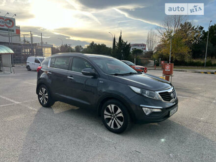 Серый Киа Sportage, объемом двигателя 2 л и пробегом 205 тыс. км за 13950 $, фото 1 на Automoto.ua