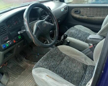 Синий Киа Sportage, объемом двигателя 2 л и пробегом 1 тыс. км за 1500 $, фото 2 на Automoto.ua