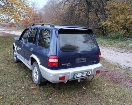 Синий Киа Sportage, объемом двигателя 2 л и пробегом 210 тыс. км за 3300 $, фото 2 на Automoto.ua