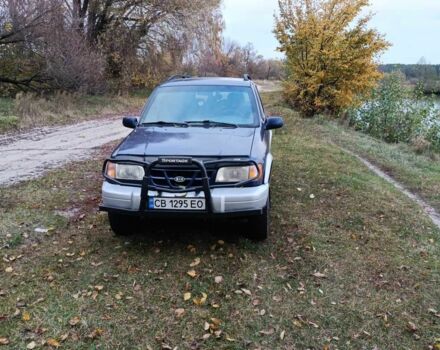 Синий Киа Sportage, объемом двигателя 2 л и пробегом 210 тыс. км за 3300 $, фото 4 на Automoto.ua