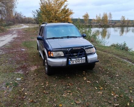 Синий Киа Sportage, объемом двигателя 2 л и пробегом 210 тыс. км за 3300 $, фото 3 на Automoto.ua