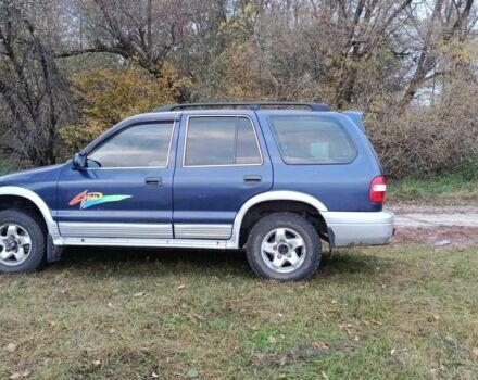 Синий Киа Sportage, объемом двигателя 2 л и пробегом 210 тыс. км за 3300 $, фото 6 на Automoto.ua