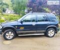 Синий Киа Sportage, объемом двигателя 2 л и пробегом 182 тыс. км за 4200 $, фото 1 на Automoto.ua