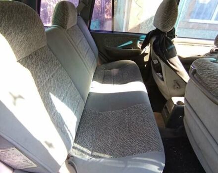 Синий Киа Sportage, объемом двигателя 2 л и пробегом 250 тыс. км за 2999 $, фото 3 на Automoto.ua