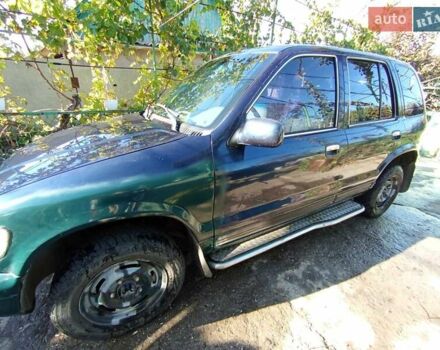 Синий Киа Sportage, объемом двигателя 2 л и пробегом 250 тыс. км за 2999 $, фото 5 на Automoto.ua