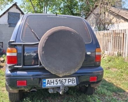 Синій Кіа Sportage, об'ємом двигуна 2 л та пробігом 240 тис. км за 5000 $, фото 6 на Automoto.ua