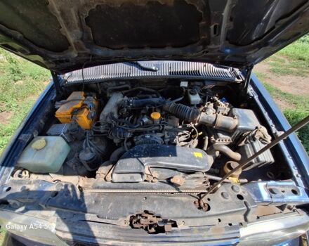 Синій Кіа Sportage, об'ємом двигуна 2 л та пробігом 240 тис. км за 5000 $, фото 4 на Automoto.ua