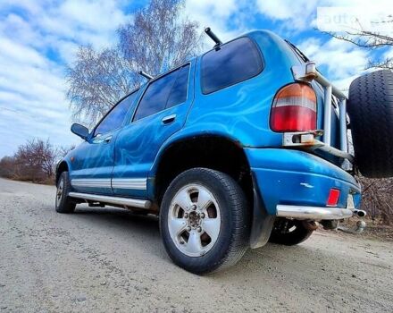 Синій Кіа Sportage, об'ємом двигуна 2 л та пробігом 300 тис. км за 2950 $, фото 4 на Automoto.ua