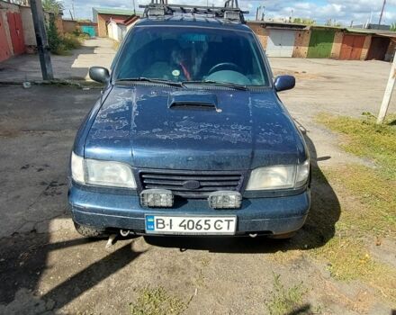 Синий Киа Sportage, объемом двигателя 2 л и пробегом 400 тыс. км за 4000 $, фото 5 на Automoto.ua