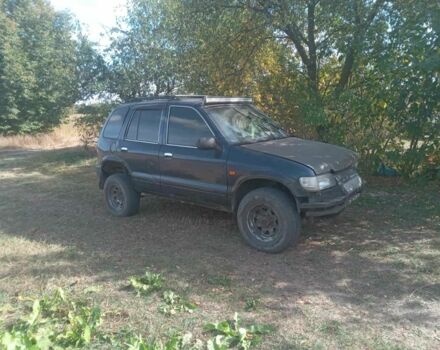 Синий Киа Sportage, объемом двигателя 2 л и пробегом 1 тыс. км за 2200 $, фото 3 на Automoto.ua