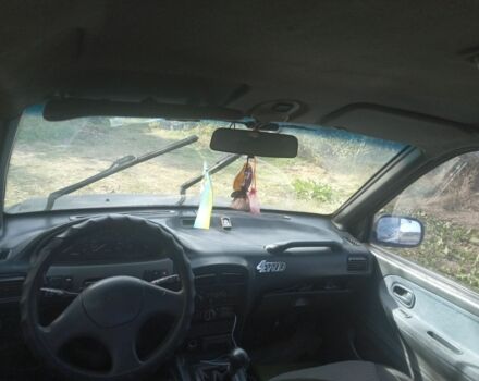 Синий Киа Sportage, объемом двигателя 2 л и пробегом 1 тыс. км за 2200 $, фото 4 на Automoto.ua