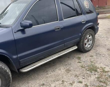 Синий Киа Sportage, объемом двигателя 2 л и пробегом 10 тыс. км за 3000 $, фото 4 на Automoto.ua