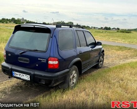 Синій Кіа Sportage, об'ємом двигуна 2 л та пробігом 200 тис. км за 3500 $, фото 3 на Automoto.ua