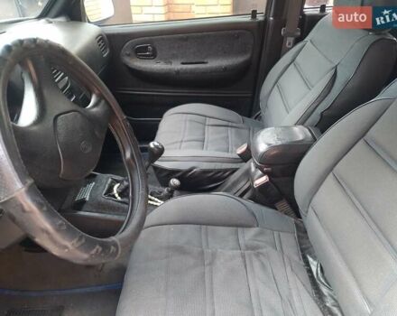 Синій Кіа Sportage, об'ємом двигуна 2 л та пробігом 200 тис. км за 3100 $, фото 6 на Automoto.ua