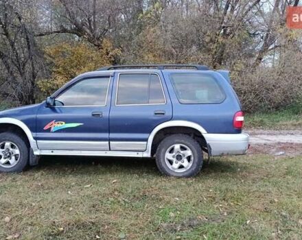 Синий Киа Sportage, объемом двигателя 2 л и пробегом 210 тыс. км за 3300 $, фото 5 на Automoto.ua