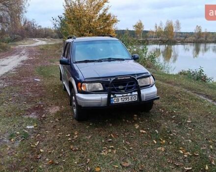 Синий Киа Sportage, объемом двигателя 2 л и пробегом 210 тыс. км за 3300 $, фото 2 на Automoto.ua