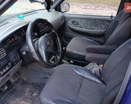 Синий Киа Sportage, объемом двигателя 2 л и пробегом 210 тыс. км за 3300 $, фото 6 на Automoto.ua