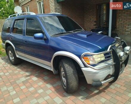 Синій Кіа Sportage, об'ємом двигуна 2 л та пробігом 200 тис. км за 3100 $, фото 1 на Automoto.ua