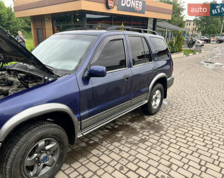 Синий Киа Sportage, объемом двигателя 2 л и пробегом 340 тыс. км за 4500 $, фото 2 на Automoto.ua