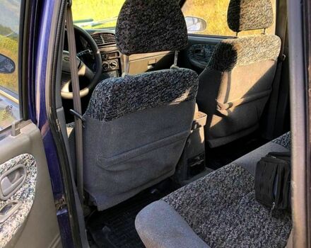 Синій Кіа Sportage, об'ємом двигуна 2 л та пробігом 250 тис. км за 3000 $, фото 4 на Automoto.ua