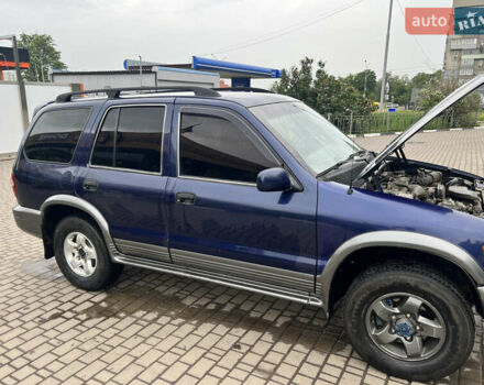 Синий Киа Sportage, объемом двигателя 2 л и пробегом 340 тыс. км за 4500 $, фото 3 на Automoto.ua