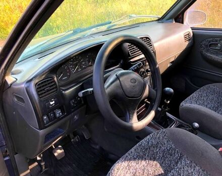 Синій Кіа Sportage, об'ємом двигуна 2 л та пробігом 250 тис. км за 3000 $, фото 5 на Automoto.ua