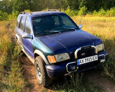 Синій Кіа Sportage, об'ємом двигуна 2 л та пробігом 250 тис. км за 3000 $, фото 1 на Automoto.ua