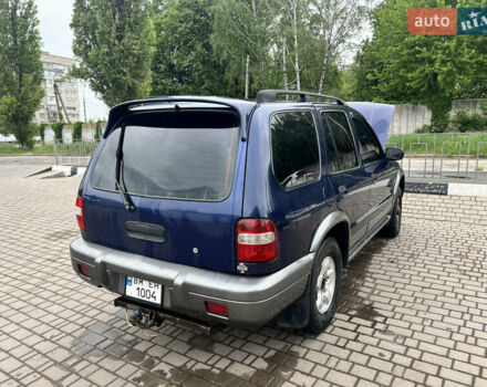 Синий Киа Sportage, объемом двигателя 2 л и пробегом 340 тыс. км за 4500 $, фото 4 на Automoto.ua