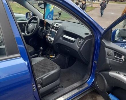 Синий Киа Sportage, объемом двигателя 2 л и пробегом 207 тыс. км за 6800 $, фото 4 на Automoto.ua