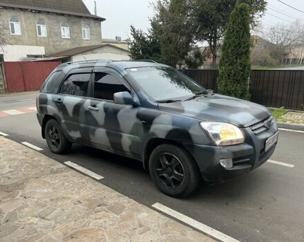 Синий Киа Sportage, объемом двигателя 2 л и пробегом 200 тыс. км за 4300 $, фото 1 на Automoto.ua
