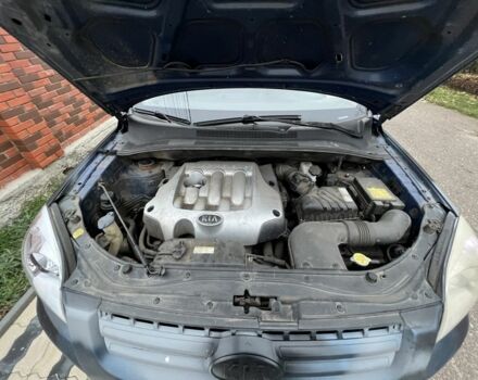 Синий Киа Sportage, объемом двигателя 2 л и пробегом 200 тыс. км за 4300 $, фото 7 на Automoto.ua