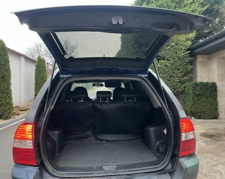 Синий Киа Sportage, объемом двигателя 2 л и пробегом 200 тыс. км за 4300 $, фото 3 на Automoto.ua