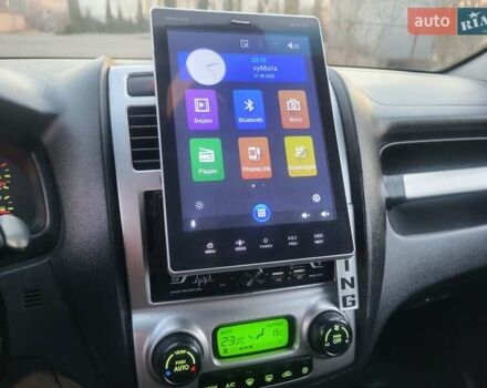 Синий Киа Sportage, объемом двигателя 1.98 л и пробегом 258 тыс. км за 7400 $, фото 118 на Automoto.ua