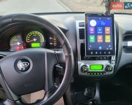 Синий Киа Sportage, объемом двигателя 1.98 л и пробегом 258 тыс. км за 7400 $, фото 120 на Automoto.ua