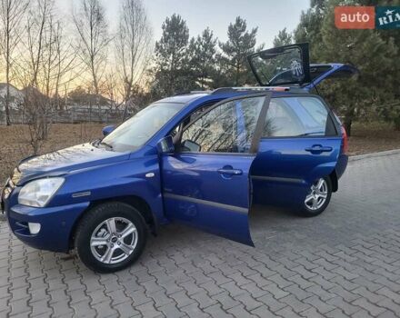 Синий Киа Sportage, объемом двигателя 1.98 л и пробегом 258 тыс. км за 7400 $, фото 63 на Automoto.ua