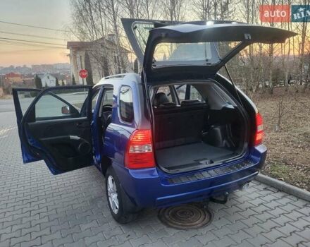 Синий Киа Sportage, объемом двигателя 1.98 л и пробегом 258 тыс. км за 7400 $, фото 58 на Automoto.ua