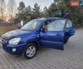 Синий Киа Sportage, объемом двигателя 1.98 л и пробегом 258 тыс. км за 7400 $, фото 62 на Automoto.ua