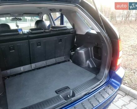 Синий Киа Sportage, объемом двигателя 1.98 л и пробегом 258 тыс. км за 7400 $, фото 96 на Automoto.ua