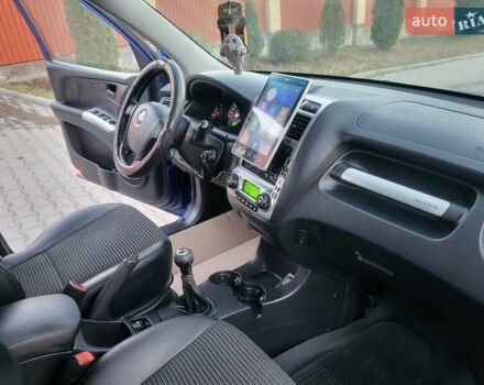 Синий Киа Sportage, объемом двигателя 1.98 л и пробегом 258 тыс. км за 7400 $, фото 80 на Automoto.ua