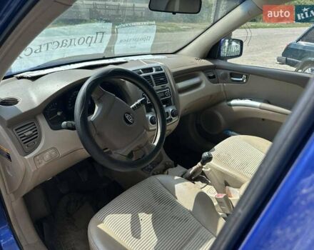 Синій Кіа Sportage, об'ємом двигуна 2 л та пробігом 460 тис. км за 3634 $, фото 4 на Automoto.ua