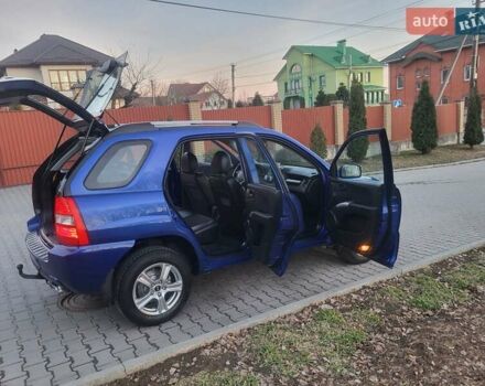 Синий Киа Sportage, объемом двигателя 1.98 л и пробегом 258 тыс. км за 7400 $, фото 74 на Automoto.ua