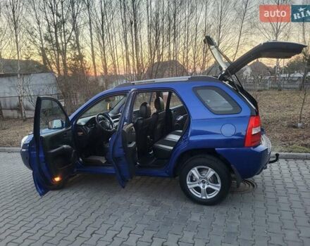 Синий Киа Sportage, объемом двигателя 1.98 л и пробегом 258 тыс. км за 7400 $, фото 67 на Automoto.ua