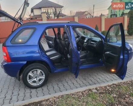 Синий Киа Sportage, объемом двигателя 1.98 л и пробегом 258 тыс. км за 7400 $, фото 75 на Automoto.ua
