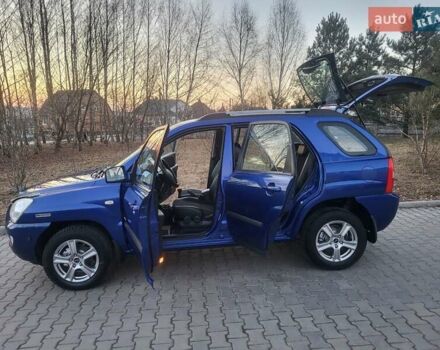 Синий Киа Sportage, объемом двигателя 1.98 л и пробегом 258 тыс. км за 7400 $, фото 53 на Automoto.ua