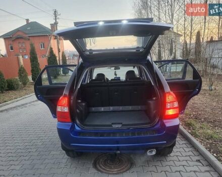 Синий Киа Sportage, объемом двигателя 1.98 л и пробегом 258 тыс. км за 7400 $, фото 71 на Automoto.ua