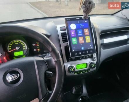 Синий Киа Sportage, объемом двигателя 1.98 л и пробегом 258 тыс. км за 7400 $, фото 123 на Automoto.ua