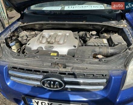 Синій Кіа Sportage, об'ємом двигуна 2 л та пробігом 460 тис. км за 3634 $, фото 6 на Automoto.ua