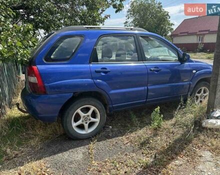 Синій Кіа Sportage, об'ємом двигуна 2 л та пробігом 460 тис. км за 3634 $, фото 3 на Automoto.ua