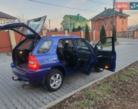 Синий Киа Sportage, объемом двигателя 1.98 л и пробегом 258 тыс. км за 7400 $, фото 61 на Automoto.ua
